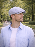 Mens light blue linen newsboy cap close up front summer hat