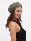 Olive khaki French beret women smiling side portrait, lightweight linen summer hat