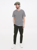 Man wearing olive linen newsboy cap full body different angle casual wear