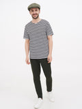 Man wearing olive linen newsboy cap full body casual summer outfit