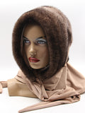 Ombre mink fur hat hood front view on mannequin showing brown crown fading to beige at face opening