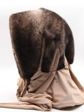 Side profile ombre mink fur hat hood scarf on mannequin showing gradient transition and champagne fabric shawl