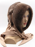 Natural ombre mink fur hat hood with brown to beige gradient and champagne fabric shawl on female model, front view