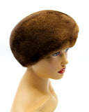 Pastel brown mink beret classic dome three-quarter left view showing warm caramel-brown fur and dome height