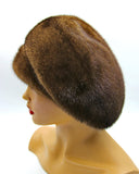 Pastel brown mink beret front view showing full voluminous crown and soft warm brown fur color