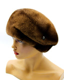 Pastel brown mink dome beret right profile view showing crown shape and natural warm brown fur sheen