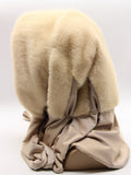 Close view pearl beige mink fur hat hood showing natural warm cream mink pile with subtle guard hair luminosity
