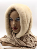 Three-quarter view pearl beige mink fur hat hood showing warm undyed mink surface and soft jersey shawl
