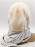 Close view pearl mink fur hat hood showing natural shimmer guard hair tips in warm beige mink pile