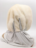 Three-quarter back view pearl mink fur hat hood scarf showing mink crown and grey fabric with pompon
