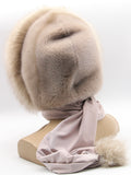 Back view powder pink mink fur hood scarf wrap on mannequin showing mink body texture and scarf tail