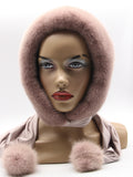 Powder pink mink fur hood front view on mannequin showing clean face opening and even dyed mink surface