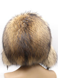 Raccoon hat from behind, right side, with honey-beige fur and dark-tipped flaps