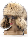 Raccoon trapper hat, right three-quarter view with ear flaps and snap strap hanging down