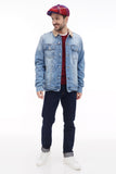Full body shot man in red blue plaid newsboy cap with denim jacket and dark jeans