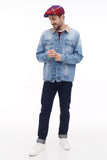Man wearing red blue plaid 8-panel baker boy hat casual stance denim jacket front