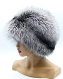 Right profile of round silver fox hat with black stripe running around the crown