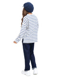 Close-up portrait of woman wearing royal blue 8-panel wool newsboy cap