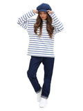 Side full body view woman in royal blue wool paperboy hat with striped outfit