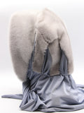 Close view sapphire mink fur hat hood showing natural blue undertone in grey mink pile and clean face edge