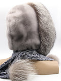 Close view sapphire mink hood on mannequin showing silver fox guard hairs around face opening