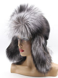 Silver fox fur hat for women with black mink crown and long ear flaps down, front view