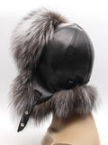 Silver fox hat from behind, right side, with flaps pulled back and cord at the nape