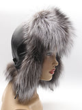 Silver fox trapper hat for women, front three-quarter view with ear flaps down