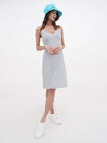 Full-length view of turquoise bucket hat with striped summer dress
