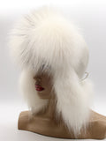 White fox fur hat for women with long fox ear flaps down, front three-quarter view