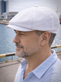 White linen baker boy hat three quarter view mens blue shirt urban