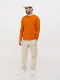 Front view man white linen newsboy orange outfit
