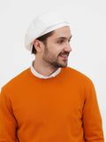White wrinkled linen newsboy cap man orange sweater portrait