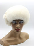 White mink beret large flower right profile showing layered petal construction and white fur sheen
