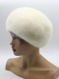 White mink fur beret with flower back view showing full dome crown and white mink coverage