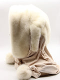 Back view white mink fur hat hood showing full natural white mink coverage and light beige fabric scarf