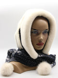 White mink fur hat hood front view on mannequin showing pure white mink and dark floral fabric scarf