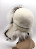 Back view of white mink ushanka showing raised ear flaps and arctic fox top