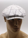 White plaid baker boy cap mannequin side view brim detail
