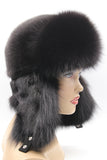 Women’s black fur trapper hat, right side view with mink ear flap and suede strap
