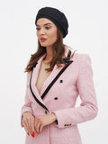 Women's black linen beret full body view with pink tweed jacket and blue flared jeans outfit