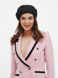 Women's black linen beret hat front close-up showing flat crown structure and linen weave texture
