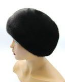 Women's black mink fur beret back view showing full crown construction and natural black fur color