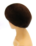 Women's brown mink fur beret three-quarter right view showing warm chocolate brown fur and dome height