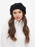 Women's dark grey wool beret with fabric flower close-up, charcoal French style hat showing tonal flower detail