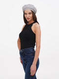 Women's grey beret hat full body view with black top and blue flared trousers, summer outfit