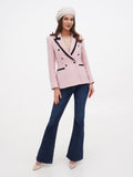 Ivory linen beret hat on woman in pink tweed blazer and flared jeans, full length front view