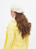 Women's ivory wool beret with fabric flower side profile view showing warm cream-white color and tonal flower detail