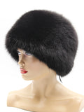 Women’s round fur hat in black fox, left three-quarter view with full crown