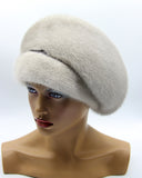 Women's sapphire grey-blue mink fur beret voluminous crown, side profile view showing cool-toned fur and full rounded silhouette